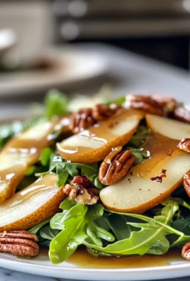 Delectable Arugula Pear Salad with Candied Pecans Recipe
