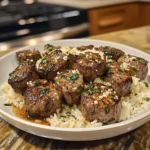 Irresistible Garlic Butter Steak Bites with Creamy Parmesan Rice