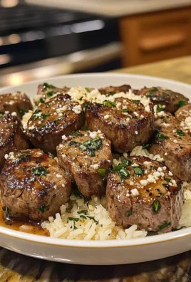 Irresistible Garlic Butter Steak Bites with Creamy Parmesan Rice